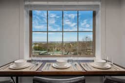 Highland Park Apt w/ Skyline Views + Parking