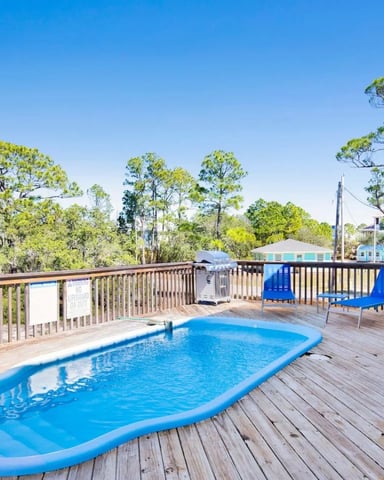Private pool on the raised back deck of the Fort Morgan beach house