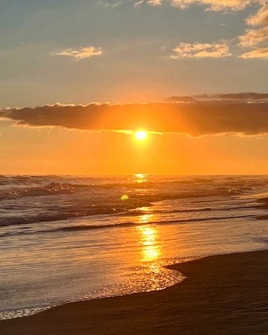 Sunset over the Gulf of Mexico from the beach at Fort Morgan